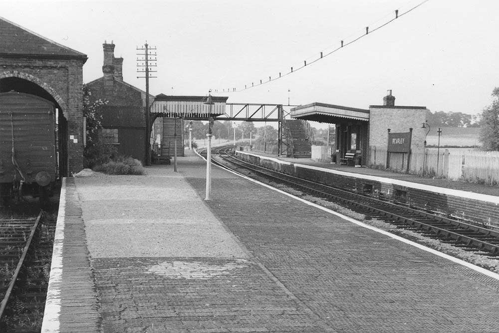 Looking towards Hatton along the up platform with the main station building located on the up platform and the goods shed on the left