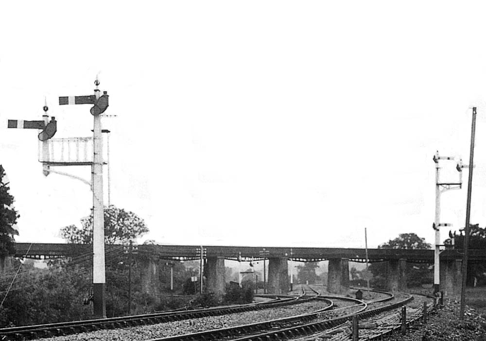 View showing the Alcester line branching away to the left and both sets of tracks passing under the viaduct
