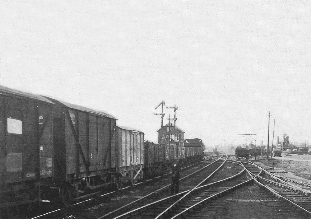 The 5.45am Leamington to Honeybourne local freight stands adjacent to Bearley East Junction Signal Box