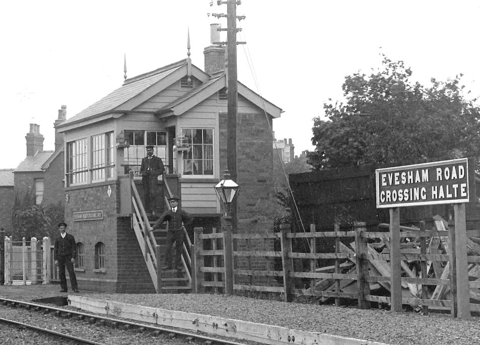 Close up showing Evesham Road Crossing's original 1891 box and three Great Western members of staff