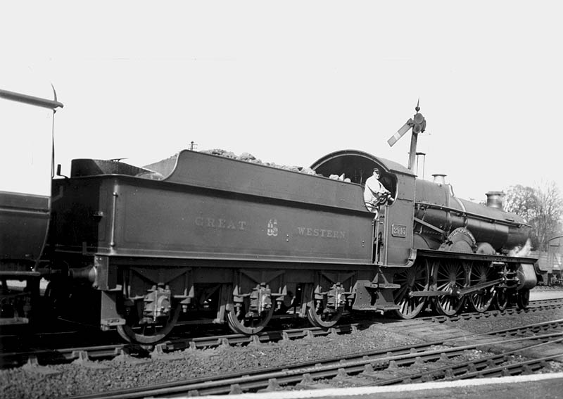 GWR 4-6-0 No 2945 'Hillingdon Court passes Hatton's home starter signal on an up service to London