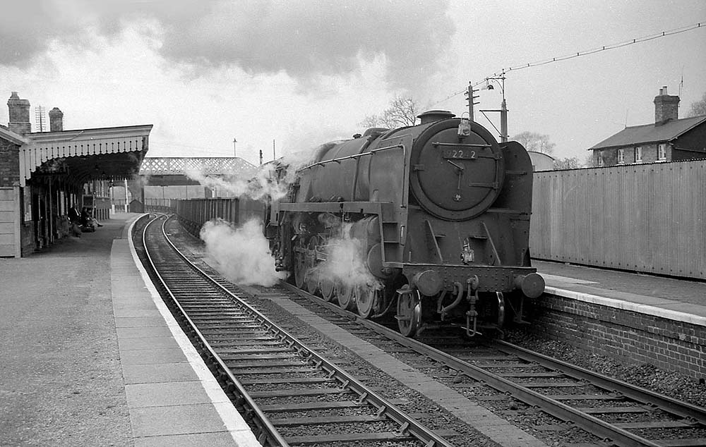 British Railways 2-10-0 Standard Class 9F No 92242 heads south at the head of an empty mineral train on 20th April 1965