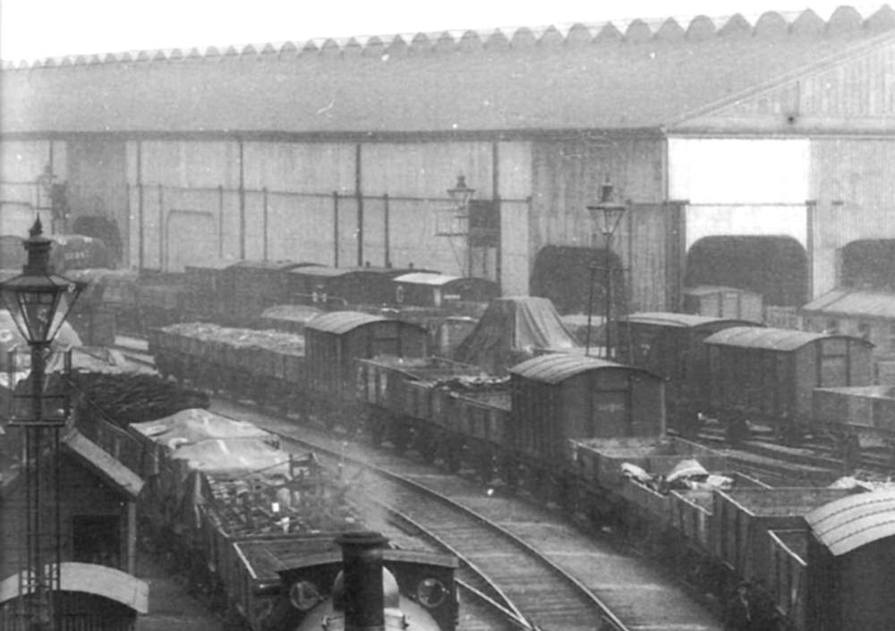 Close up showing the Outward and Tranship shed, the sidings running adjacent to it and several access doors