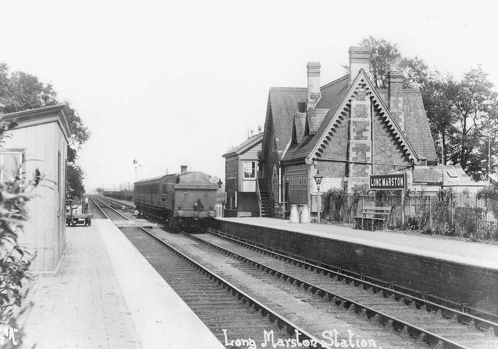 An early view of the station with what is thought to be a GWR 517 class or the 3571 class 0-4-2T (with square tanks) running bunker first