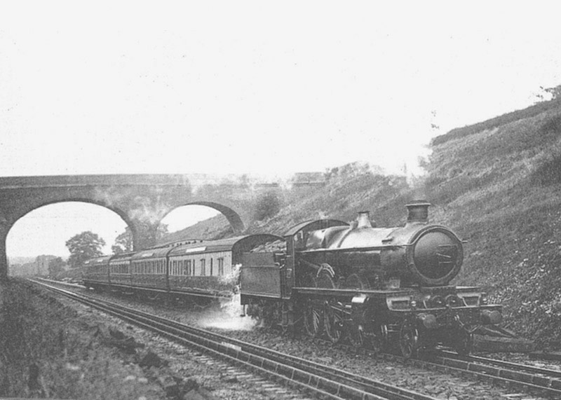 An unknown Great Western Railway 4-6-0 four cylinder 40xx Star class locomotive with a modest five coach up-express
