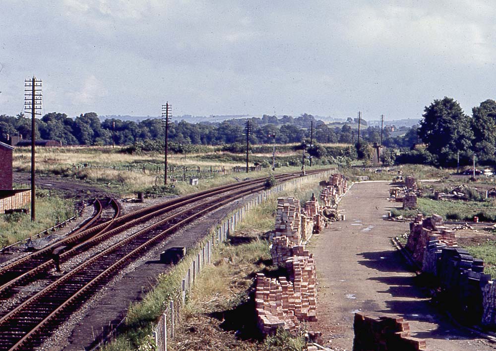 Looking south towards Stratford Race Course Platform with the now lifted connection to the SMJ line seen the left on 17th July 1966
