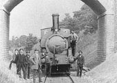 View  showing an unidentified GWR 0-6-0ST posed under 'New Bridge' Camden Road after the completion of the works to the bridge and cutting
