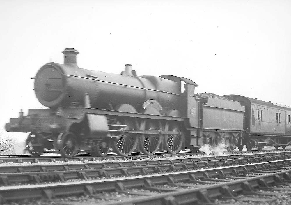 GWR 4-6-0 Saint class No 2941 'Eaton Court' is seen at the head of a down express as it approaches Solihull station