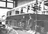 GWR Streamlined Diesel Railcar No 3 with engine covers removed in the Tyseley Repair Shop on a Saturday in 1935