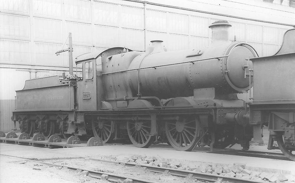 GWR 0-6-0 No 2257, a member of the 2251 class built by Collett, is seen standing on the traverser in front of Tyseley Repair shop