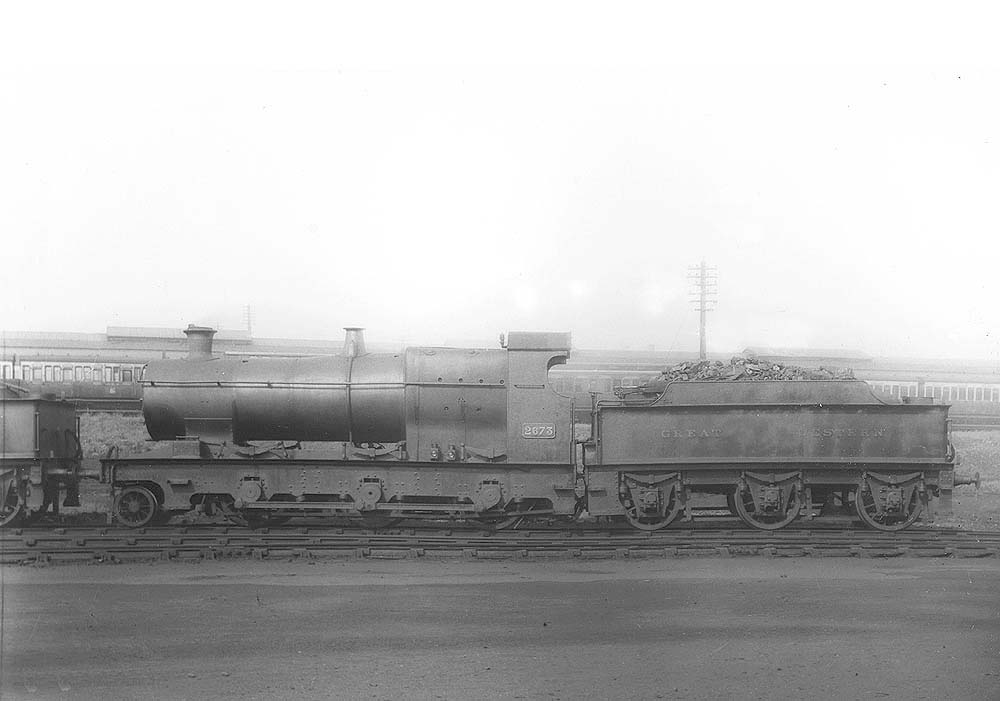 GWR 2-6-0 No 2673, an outside-framed Aberdare class locomotive, is seen standing in line in front of Tyseley's carriage sidings