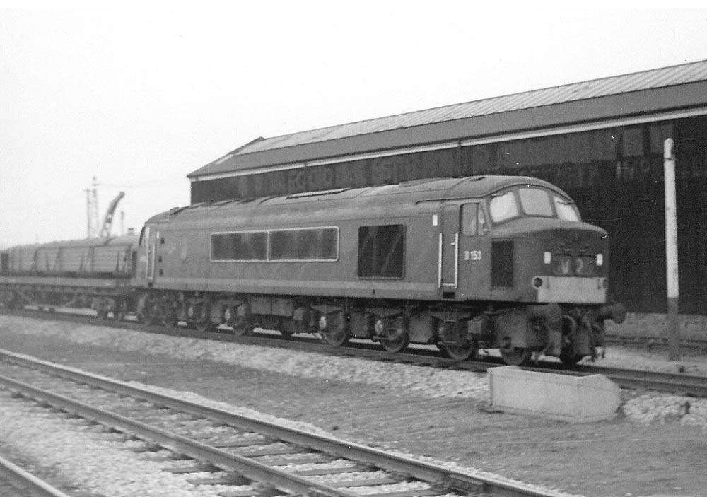 BR diesel Type 4 1Co-Co1 No D153 is seen at the head of a Washwood Heath to Banbury special freight working as it passes the carriage sidings on 15th February 1965