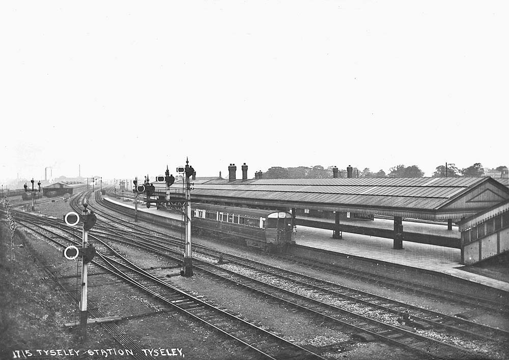 View of Tyseley Station's down relief platform with a GWR steam railcar standing at the platform waiting for the right way to Moor Street circa 1908
