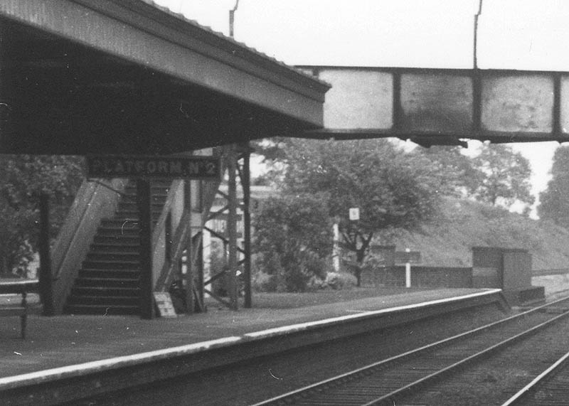 Close up showing the Down Main's Platform No 2 and the steps of the passenger footbridge erected at the time of the rebuilding of the station