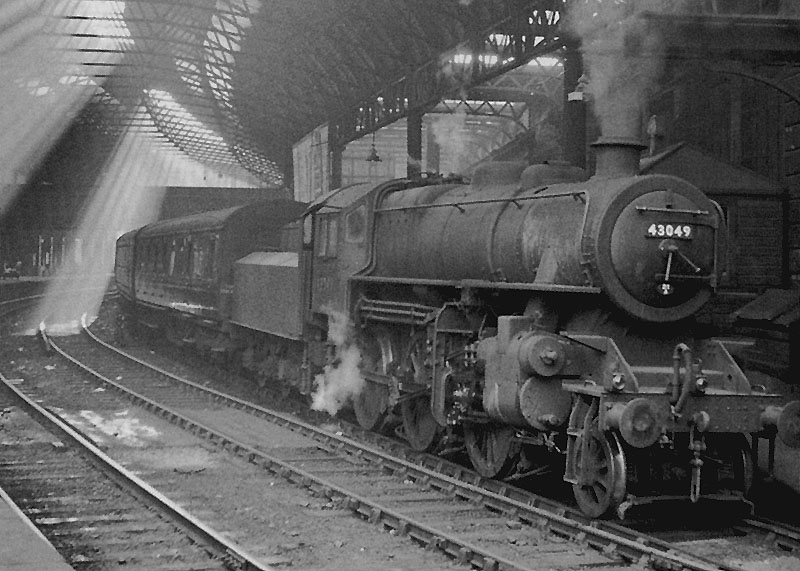 Built by British Railways Horwich Works in November 1949, Ivatt 4MT 2-6-0 No 43049 is wearing a Saltley shedplate in this view of it in New Street Station