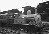 Ex-LNWR 2P 0-6-2T 'Watford Tank' No 6876 is seen on the down middle road between Platforms 3 and 4 whilst marshalling coaching stock