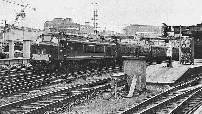 British Railways Type 4 1Co-Co1 D42 is seen departing Platform 4 at 3 31pm on a Cardiff to the North East express service on Sunday 12th September 1965