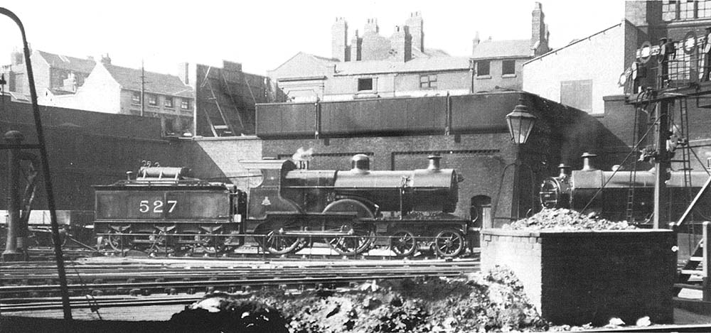 Midland Railway 2P 4-4-0 No 527 is seen in company with two other members of the 483 class as it is turned on New Street's turntable