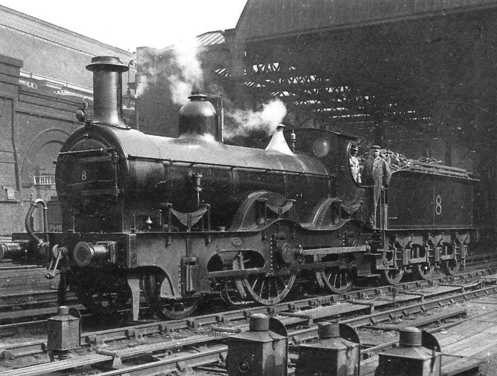 Midland Railway 2-4-0 No 8 is seen standing at the West end of New Street station on the siding between Platforms 4 and 5 whilst waiting for its coaching stock