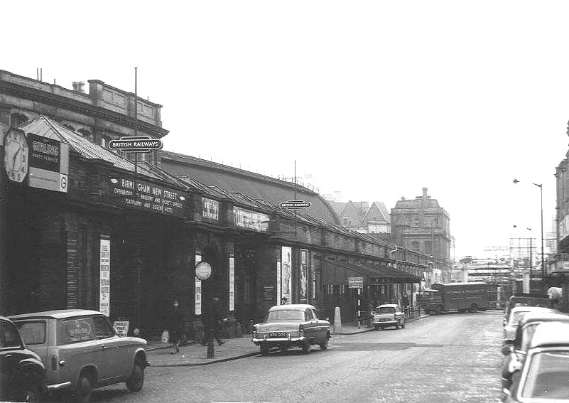 Looking along Station Street towards Worcester Street and the former Midland Railway's parcel offices with the entrances to the station on the left