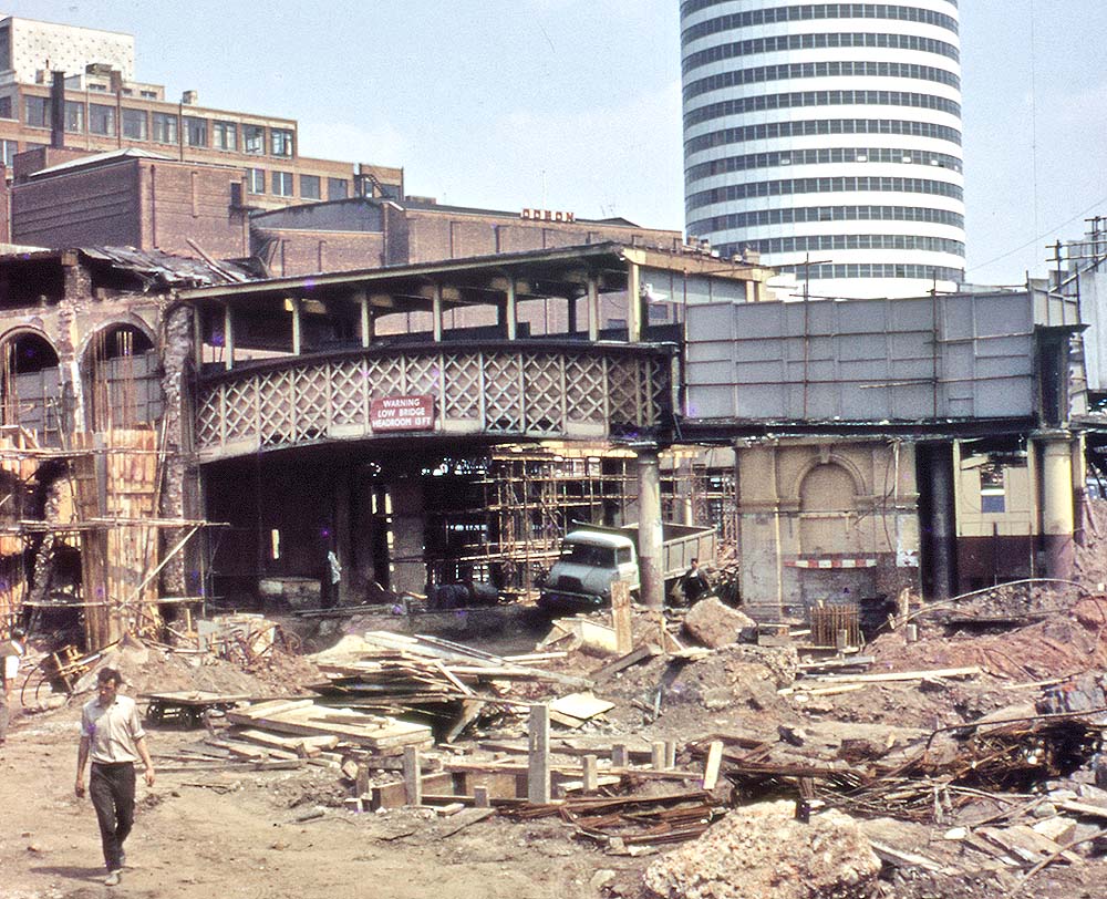 View of the partial remains of the pedestrian footbridge which crossed over Queens Drive during demolition of the station