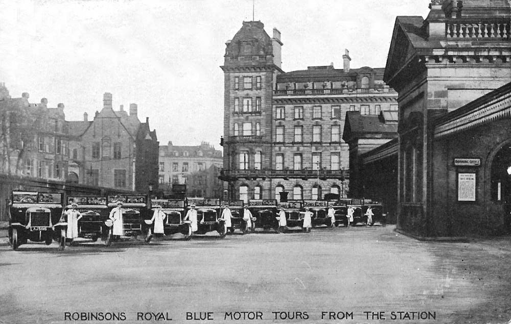 A publicity photograph taken in August 1922 advertising Robinsons Royal Blue Motor Tours which operated from the station