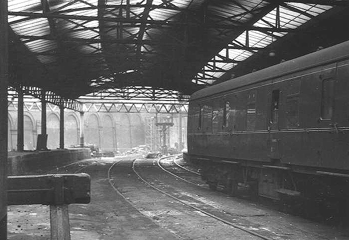 Looking from the buffer stops of Fish Sidings towards the West end of New Street station on 2nd April 1964 as the demolition of the station commences