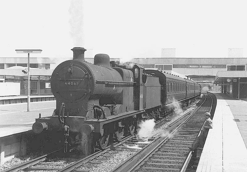 Ex-LMS 4F No 44061 is seen standing at platform three on a local Rugby to Birmingham passenger train