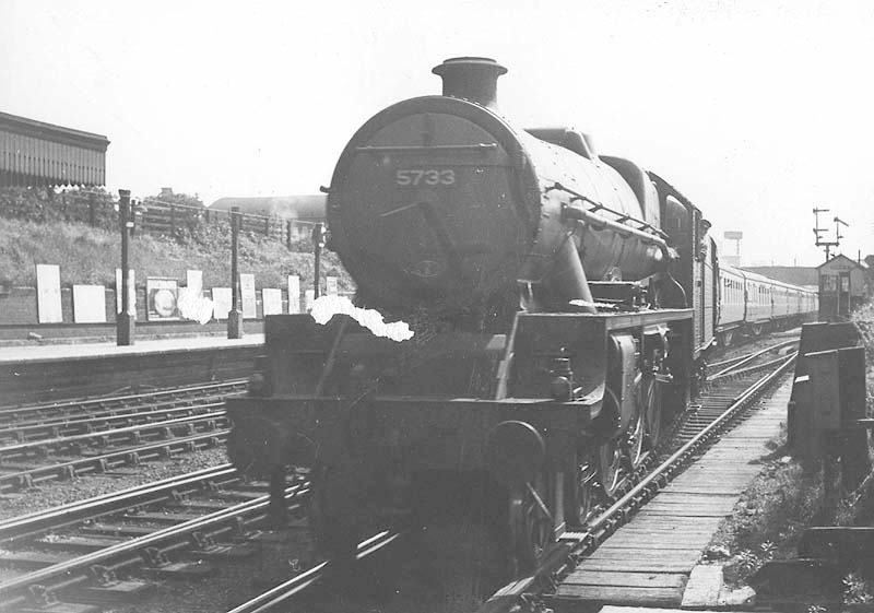 Ex-LMS 4-6-0 Jubilee class No 5733 'Novelty' is seen entering platform two at the head of a down Euston to Birmingham semi-fast express