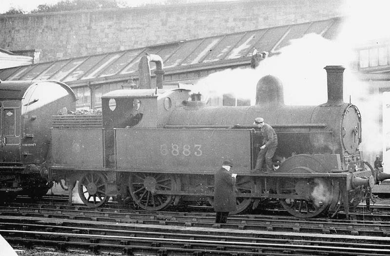 Ex-LNWR 0-6-2T No 6883 stands at the head of a down local passenger service at Platform 2 in the 1930s