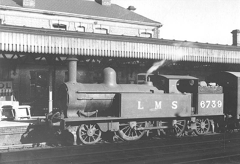 Ex-LNWR 1P 2-4-2T No 6739 is seen standing at platform one during shunting manoeuvres for the parcels depot