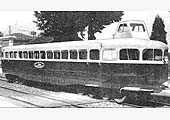 An exterior view of a Michelin 56-seater Rail-car passing itself off as a Coventry Rail Car