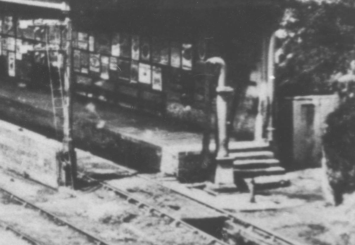 Close up showing the London end of the up platform, the water column, ash pit and the original and new signals