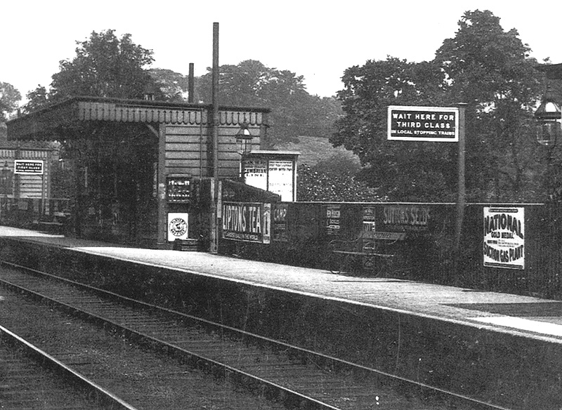 Close up showing the down platform with its sign for Third Class passengers and the entrance to the platform