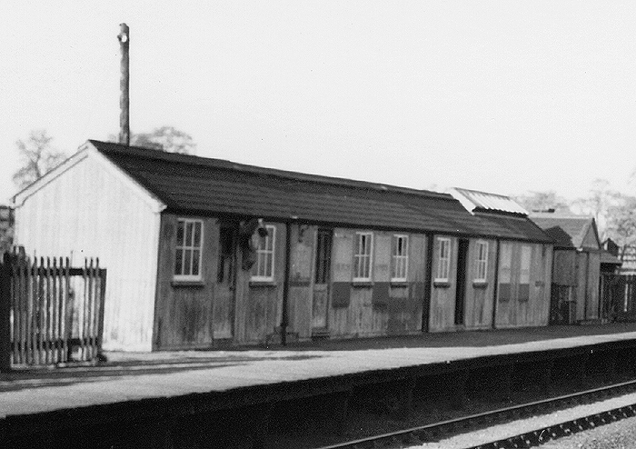 Close up showing Flecknoe station's building after passenger services were withdrawn although goods traffic still remained