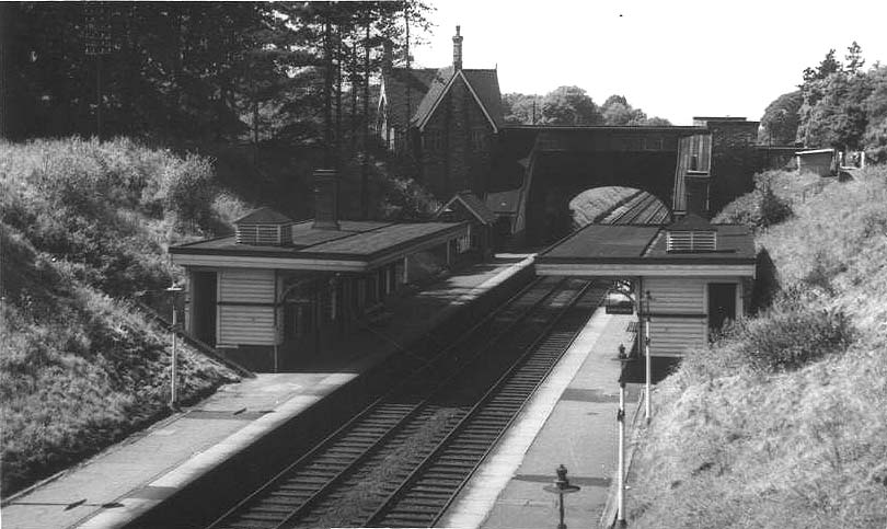 Looking north to Hampton in Arden's down platform from the up side of the occupation bridge on 27th June 1961