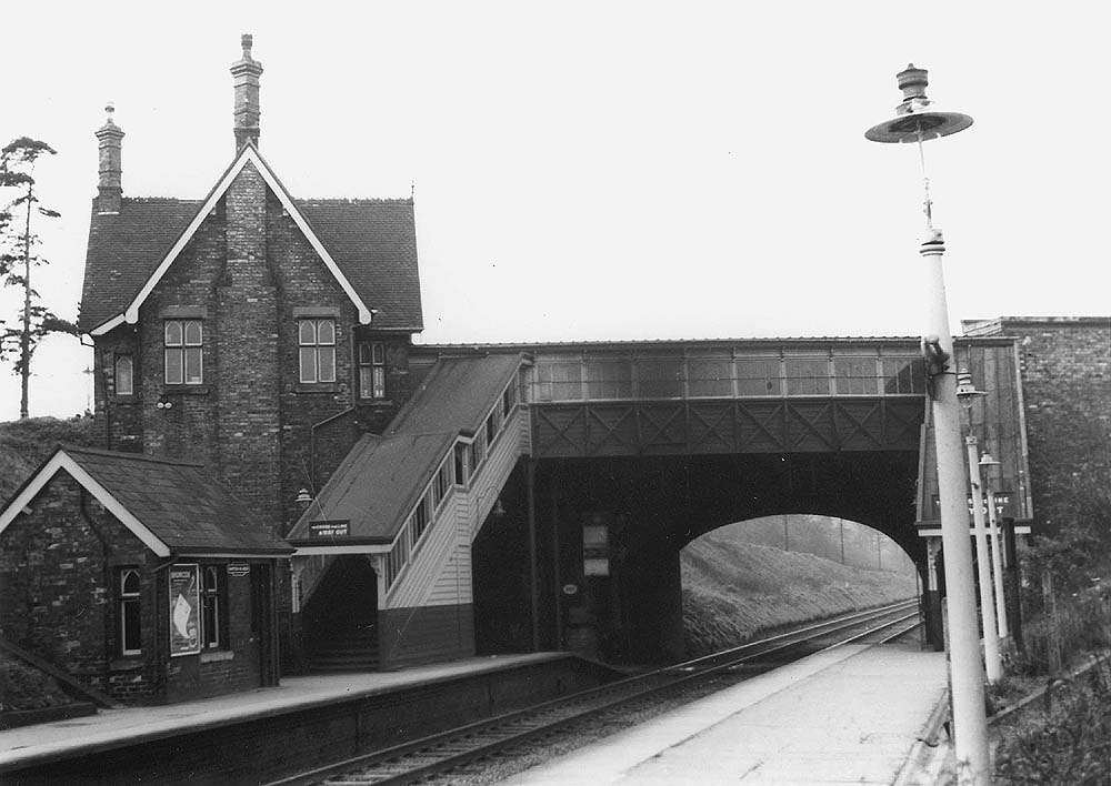 View of the rear of the roadside station building and the passenger footbridge which allowed passengers to cross the line