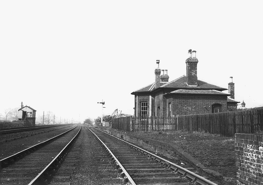 Looking towards Birmingham, with on the left the LNWR signal box controlling the junction, and on the right the former B&DJR station
