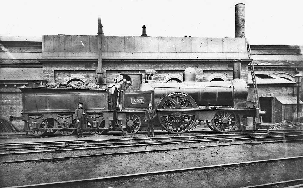 LNWR Large Bloomer 2-2-2 No 895 Torch' is seen fully coaled and watered when posed for the camera