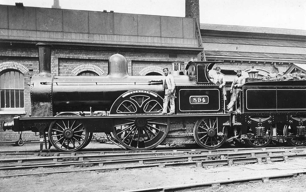 LNWR Large Bloomer 2-2-2 No 894 'Trentham' is seen fully coaled and watered when posed for the camera