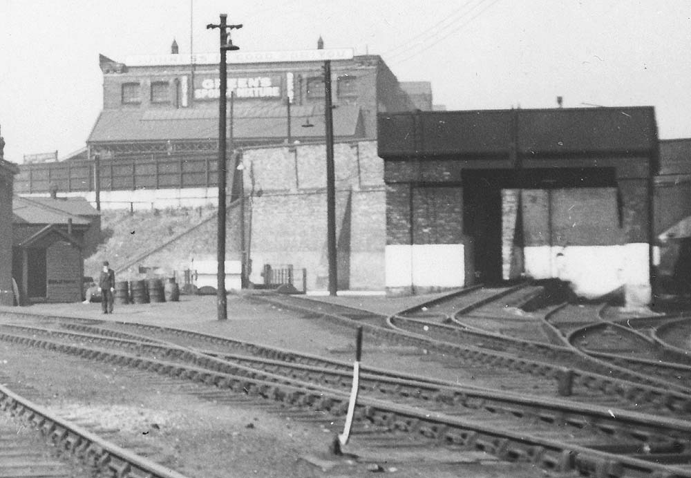 Close up showing Monument Lane's standard LNWR water tank built with a 75 to capacity and two roads