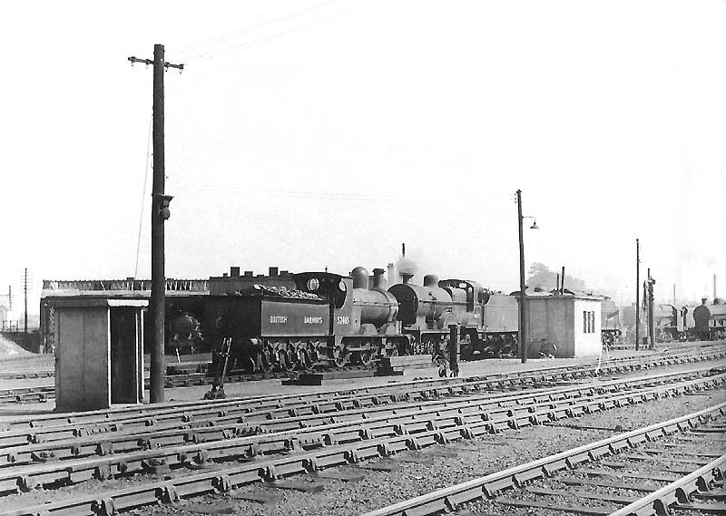 View of Nuneaton shed from the branch line to Coventry showing the locomotive shed and  the concrete built 'relief drivers' shelter