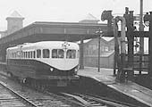 View of a fairly full Coventry Pneumatic Rail-car leaving Nuneaton station on a Coventry service on a wet day on 12th May 1937