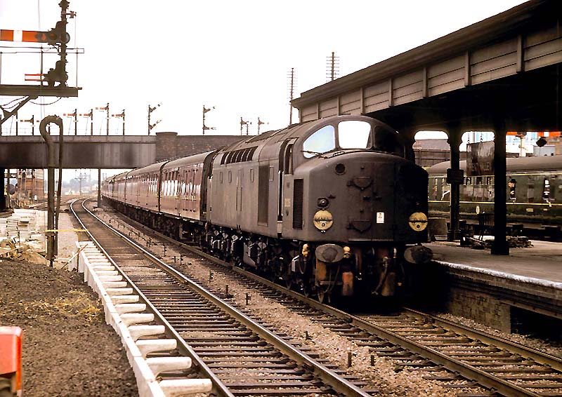 English Electric 1Co-Co1 Type 4  disel locomotive D225 passes through Nuneaton stations on a down express service