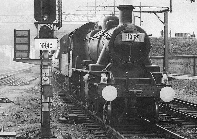 British Railways built 2MT No 46519 runs into platform 2 on 23rd April 1966 to pick up passengers for the RCTS 'St George Railtour'