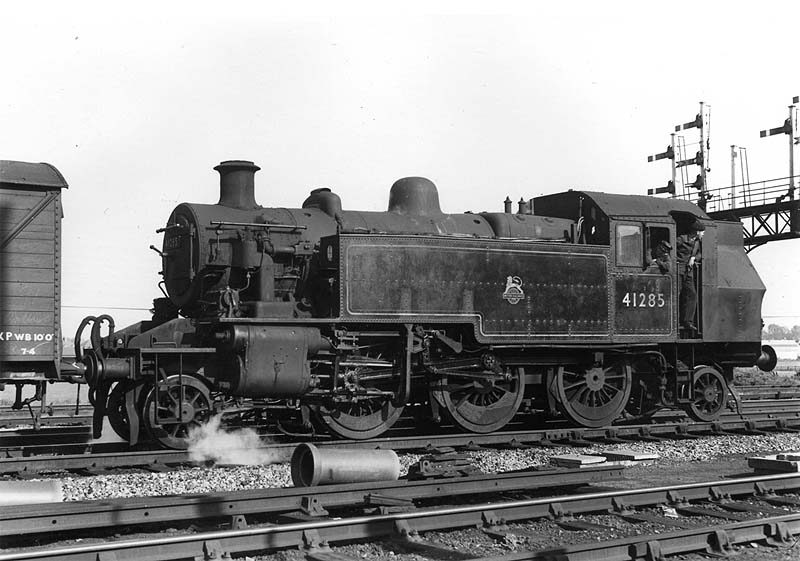 British Railways built 3MT 2-6-2T No 41285 is seen running bunker first at the head of a goods train near Ashby junction