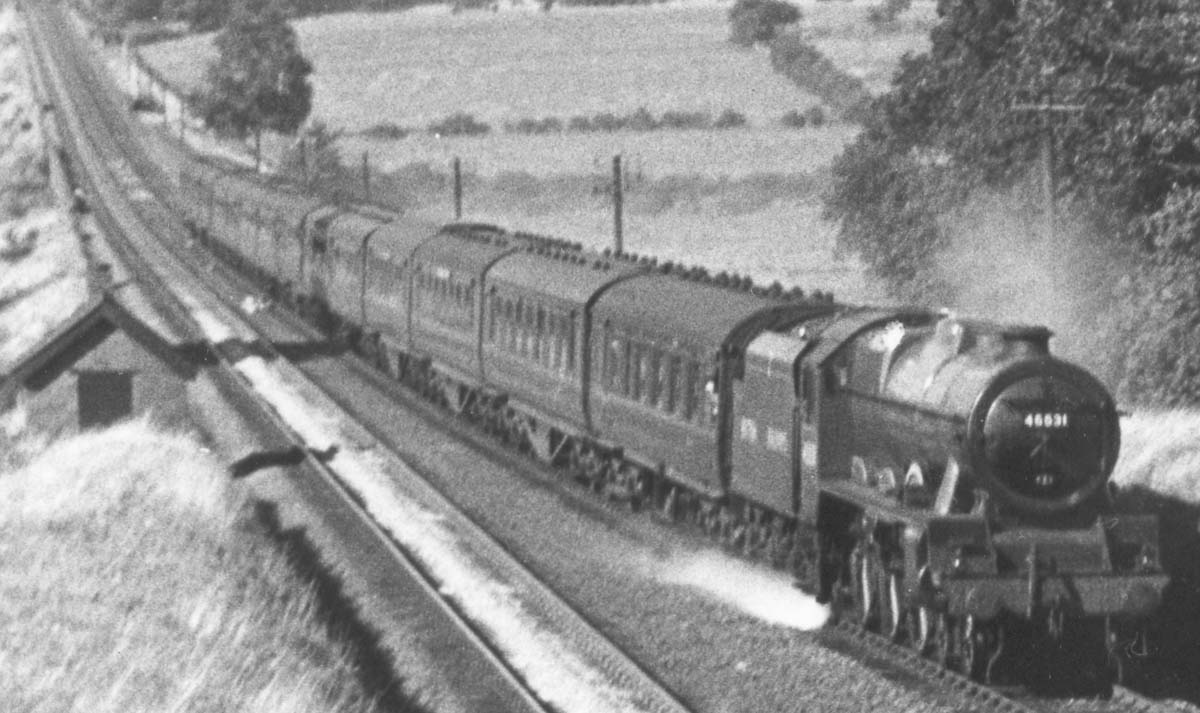 Close up showing ex-LMS 7P 4-6-0 Re-built Patriot class No 45531 'Sir Frederick Harrison' carrying the new corporate British Railways livery