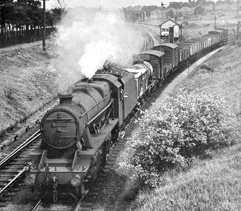 Ex-LMS 8F 2-8-0 No 48693, on a north bound freight, comes off the line from Soho to join the Grand Junction line en-route to Bescot