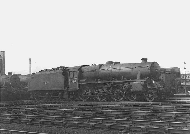 Ex-LMS 4-6-0 Black 5 No 45448 stands in line fully coaled and watered ready for service along with others in front of the shed