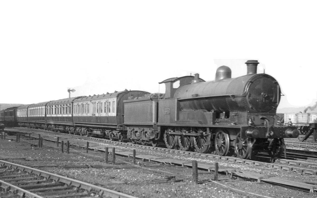 LNWR 4-6-0 Prince of Wales class No 354 is seen leaving Rugby on an up Birkenhead to Euston express circa 1919-22
